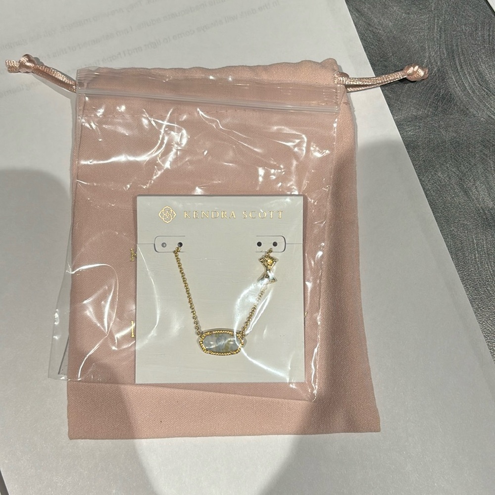 Kendra Scott love shack fancy necklace.